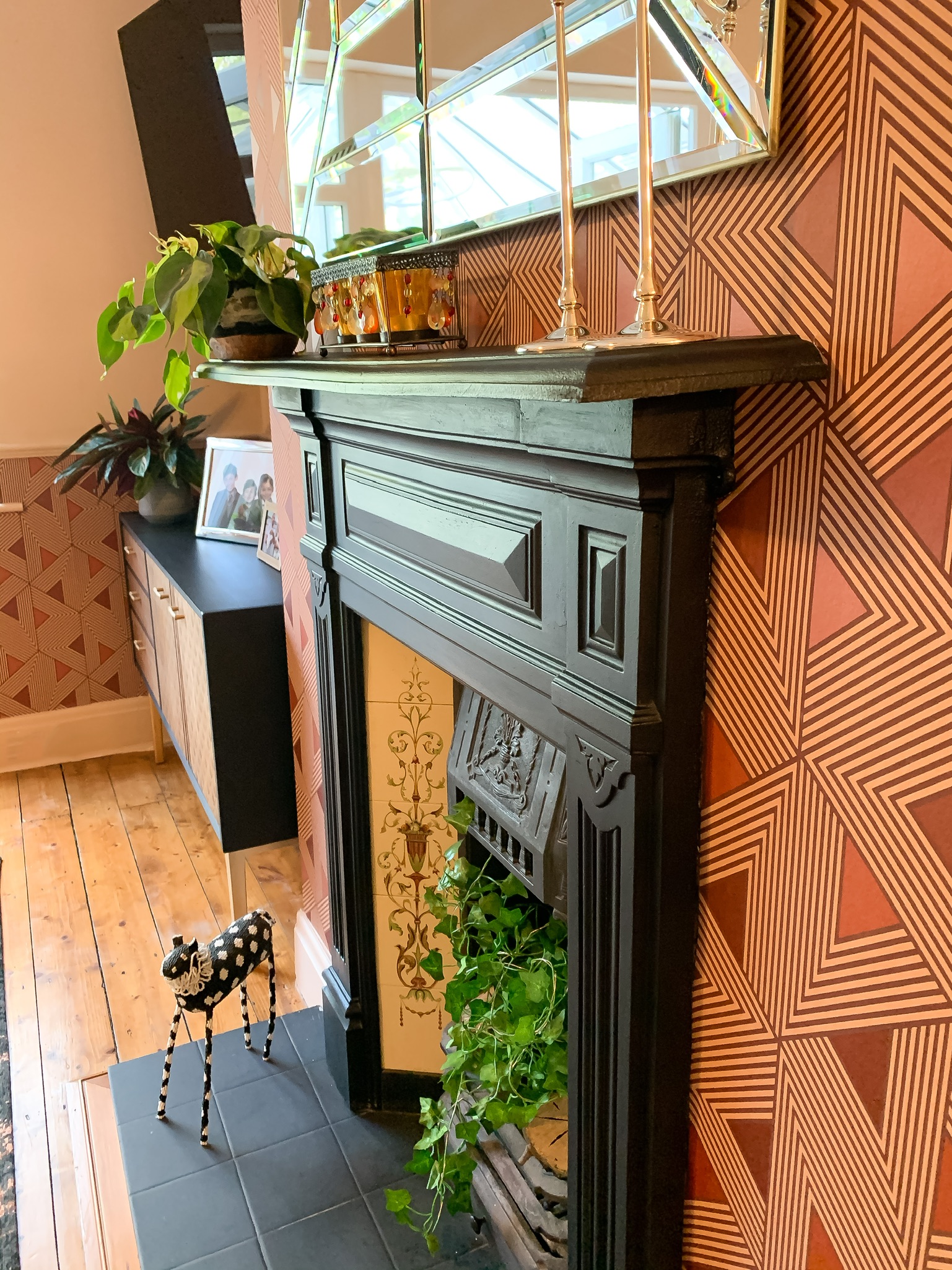 intricate detail of interior design project of fireplace in eclectic home in Hale